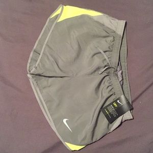 Never worn Nike DRI-FIT running shorts